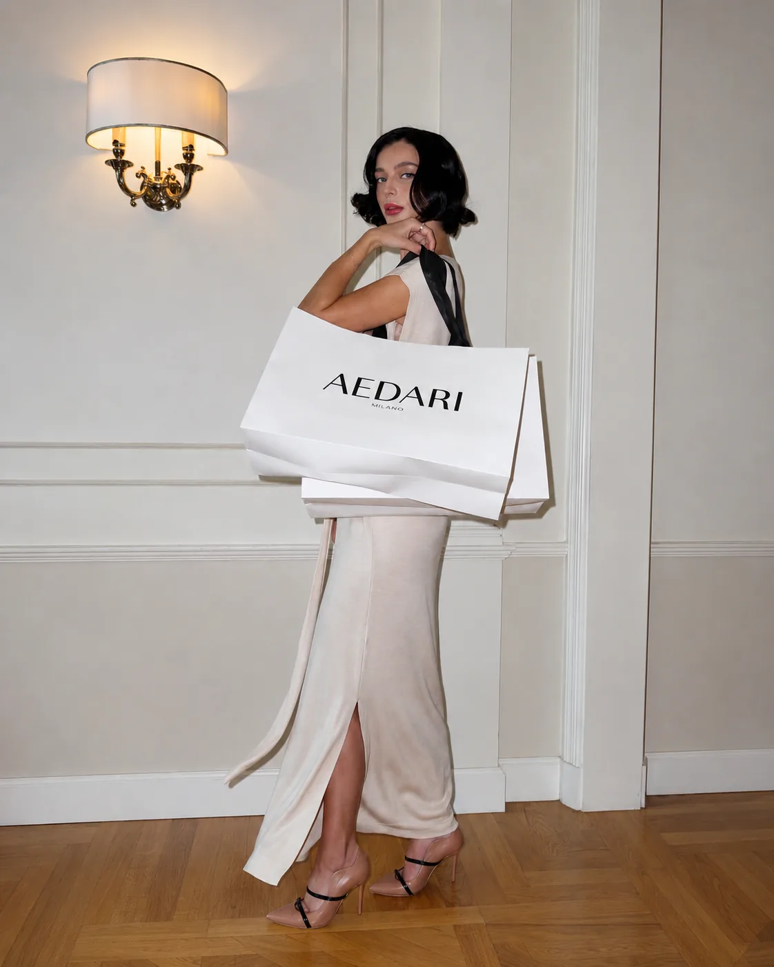 AEDARI — model with branded shopping bag
